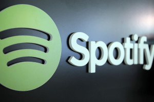 November 11, 2014 - File - A debate has taken center stage in the industry thanks to the decision by Taylor Swift to remove her entire catalog from Spotify. Calling streaming outlets like it 'a grand experiment,' Ms. Swift told Yahoo in an interview last week: 'I'm not willing to contribute my life's work to an experiment that I don't feel fairly compensates the writers, producers, artists and creators of this music.' Ms. Swift sold nearly 1.3 million copies of her latest album, '1989,' in its first week on sale, giving a talking point to critics who believe that Spotify, for all its hype, is not necessary for success. Pictured - Feb. 25, 2014 - Berlin,  Germany - The logo of the music streaming service Spotify in Berlin. (Credit Image: © Britta Pedersen/DPA/ZUMAPRESS.com)