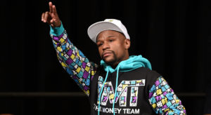 LAS VEGAS, NV - SEPTEMBER 12: Floyd Mayweather Jr. walks in to his post-fight news conference at MGM Grand Hotel & Casino after he retained his WBC/WBA welterweight titles in a unanimous-decision victory over Andre Berto on September 12, 2015 in Las Vegas, Nevada. (Photo by Ethan Miller/Getty Images)